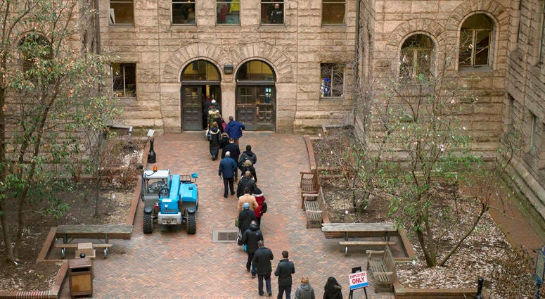 People arrive to the Allegheny County Courthouse prior to the start of the second day of the homicide trial of former East Pittsburgh police officer Michael Rosfeld March 20, 2019. People arrive to the Allegheny County Courthouse prior to the start of the second day of the homicide trial of former East Pittsburgh police officer Michael Rosfeld March 20, 2019.