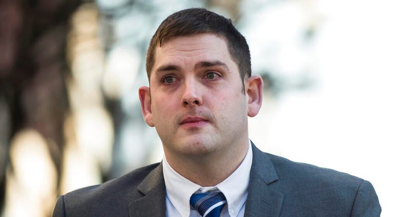 In this March 12, 2019 file photo, former East Pittsburgh police officer Michael Rosfeld, charged with homicide in the shooting death of Antwon Rose II, walks to the Dauphin County Courthouse in Harrisburg, Pa. Michael Rosfeld