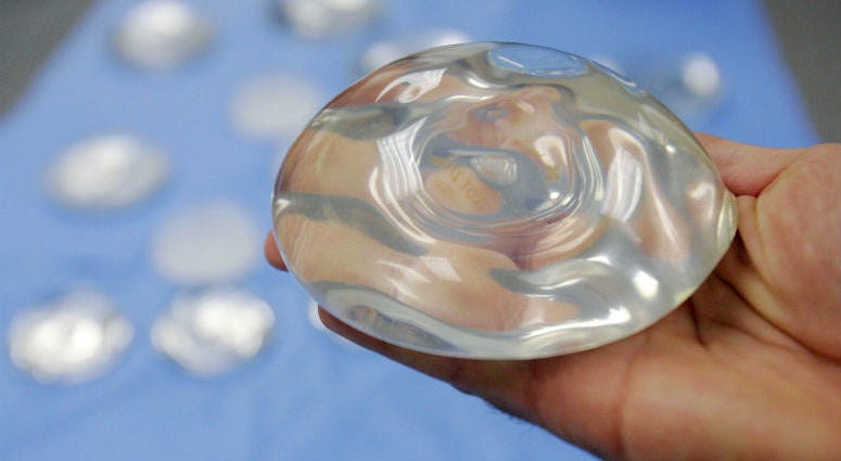 FILE - This Dec. 11, 2006 file photo shows a silicone gel breast implant in Irving, Texas. U.S. health officials are taking another look at the safety of breast implants, the latest review in a decades-long debate. U.S. health officials are taking another look at the safety of breast implants, the latest review in a decades-long debate.