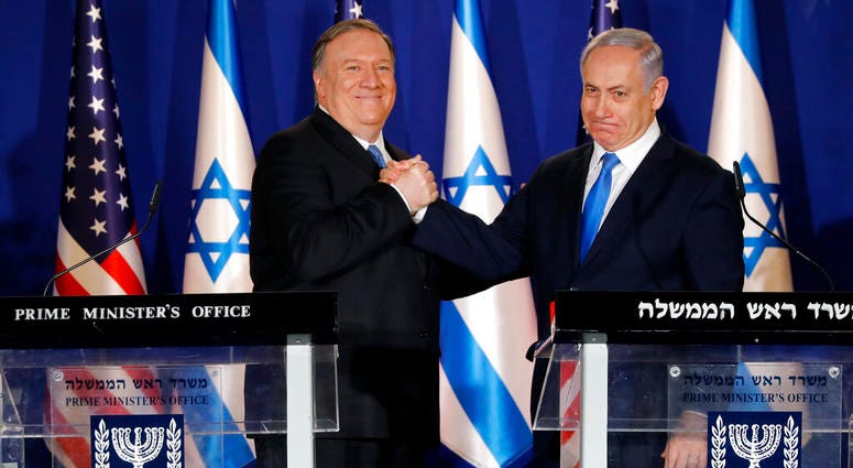 U.S. Secretary of State Mike Pompeo, left, shakes hands with Israeli Prime Minister Benjamin Netanyahu, during their visit to Netanyahu's official residence in Jerusalem, Thursday March 21, 2019. U.S. Secretary of State Mike Pompeo, left, shakes hands with Israeli Prime Minister Benjamin Netanyahu.