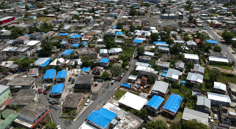 This June 18, 2018, file photo shows an aerial view of the Amelia neighborhood in the municipality of Catano, east of San Juan, Puerto Rico. This June 18, 2018, file photo shows an aerial view of the Amelia neighborhood in the municipality of Catano, east of San Juan, Puerto Rico.