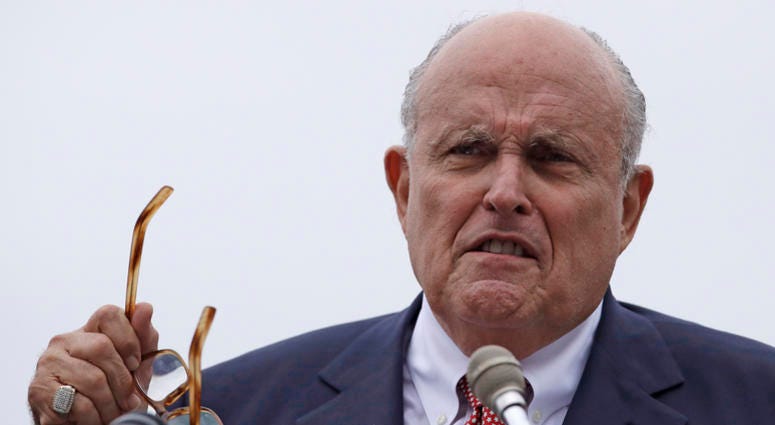 In this Aug. 1, 2018, file photo, Rudy Giuliani, an attorney for President Donald Trump, speaks in Portsmouth, N.H. Rudy Giuliani