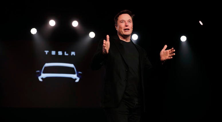 In this March 14, 2019, file photo Tesla CEO Elon Musk speaks before unveiling the Model Y at Tesla's design studio in Hawthorne, Calif. Tesla CEO Elon Musk