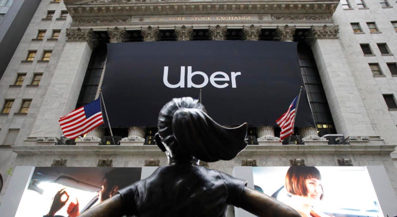 The statue of Fearless Girl stands in front of the New York Stock Exchange before Uber, the world's largest ride-hailing service, holds its initial public offering, Friday, May 10, 2019. The statue of Fearless Girl stands in front of the New York Stock Exchange before Uber, the world's largest ride-hailing service, holds its initial public offering, Friday, May 10, 2019.