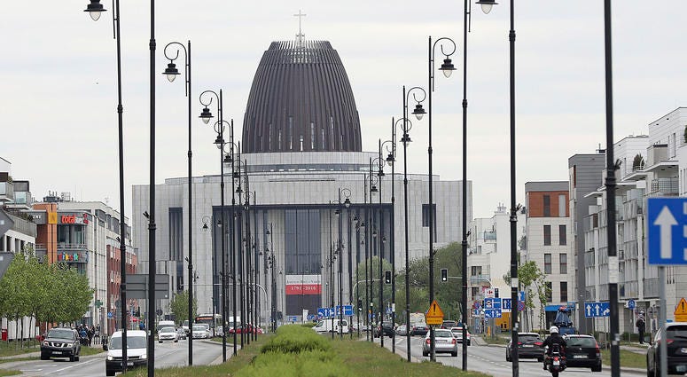 Cars drive on the street in front of the Temple of Divine Providence, a major church in the Polish capital, in Warsaw, Poland, Monday, May 13, 2019. Temple of Divine Providence, a major church in Warsaw, Poland.