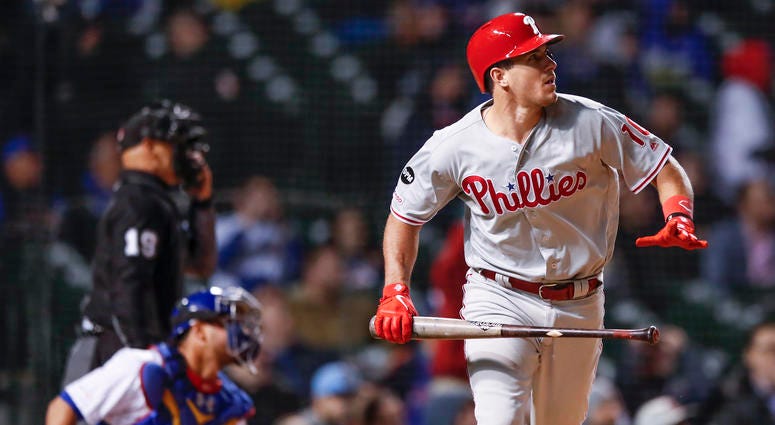 Philadelphia Phillies' J.T. Realmuto watches his solo home run against the Chicago Cubs during the 10th inning of a baseball game, Monday, May 20, 2019, in Chicago. Philadelphia Phillies' J.T. Realmuto