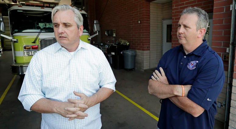 In this Tuesday, May 28, 2019 photo, Timothy Stromsnes, left, president of the Reedy Creek Professional Firefighters, Local 2117 and union vice president Sean Pierce air concerns about the firefighting staff at Walt Disney World in Lake Buena Vista, Fla. Disney firefirghters