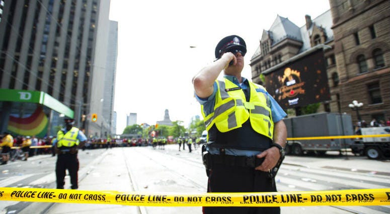 Toronto Police secure the scene after a shots were fired during the Toronto Raptors NBA basketball championship parade in Toronto, Monday, June 17, 2019. Toronto Police secure the scene after a shots were fired during the Toronto Raptors NBA basketball championship parade in Toronto, Monday, June 17, 2019.