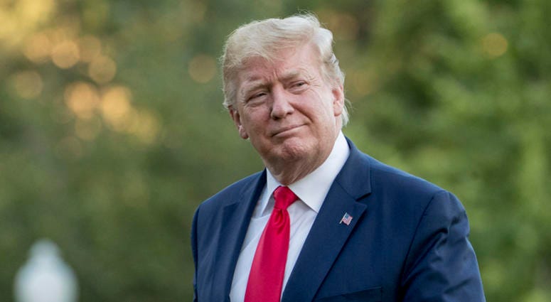 In this June 30, 2019 file photo, President Donald Trump walks across the South Lawn as he arrives at the White House in Washington. In this June 30, 2019 file photo, President Donald Trump walks across the South Lawn as he arrives at the White House in Washington.