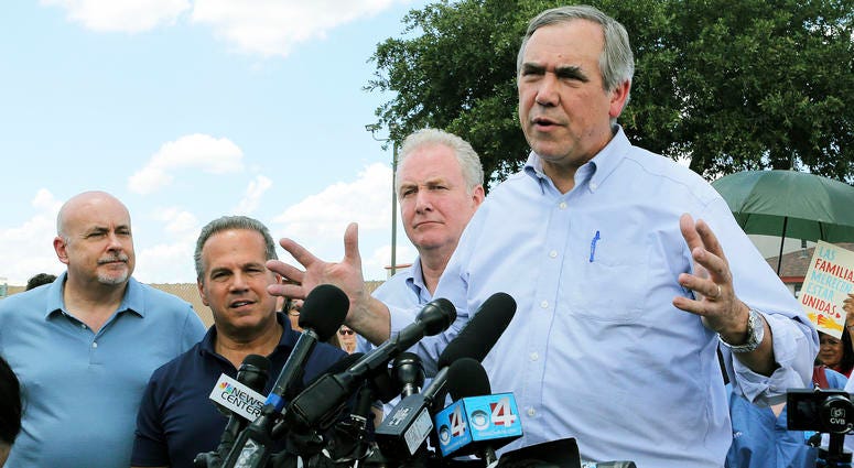In this June 17, 2018, file photo, U.S. Sen. Jeff Merkley, from right, from Oregon, speaks to the media In this June 17, 2018, file photo, U.S. Sen. Jeff Merkley, from right, from Oregon, speaks to the media