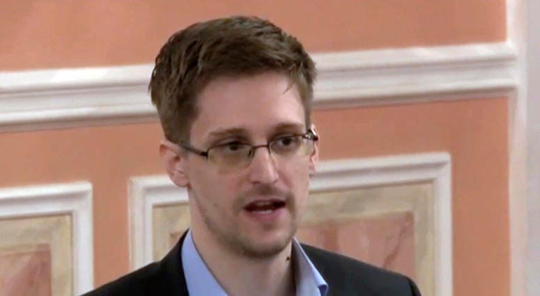 In this Oct. 11, 2013 file image made from video and released by WikiLeaks, former National Security Agency systems analyst Edward Snowden speaks in Moscow. Snowden has written a memoir. In this Oct. 11, 2013 file image made from video and released by WikiLeaks, former National Security Agency systems analyst Edward Snowden speaks in Moscow. Snowden has written a memoir.
