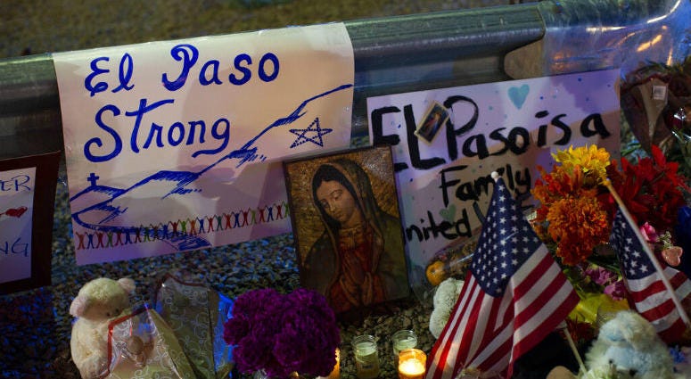 A Virgin Mary painting, flags and flowers adorn a makeshift memorial for the victims of Saturday's mass shooting at a shopping complex in El Paso, Texas, Sunday, Aug. 4, 2019. A Virgin Mary painting, flags and flowers adorn a makeshift memorial for the victims of Saturday's mass shooting at a shopping complex in El Paso, Texas, Sunday, Aug. 4, 2019.