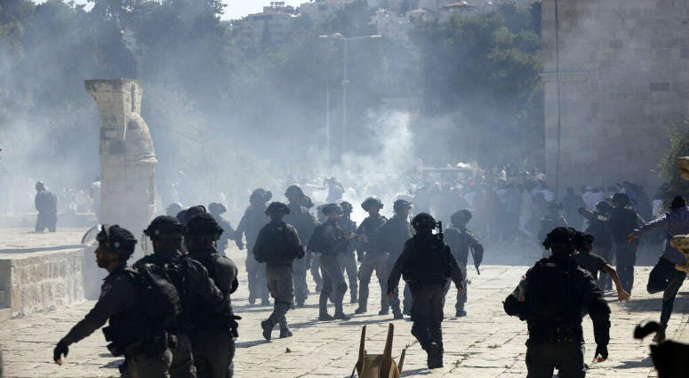 Israeli police clashes with Palestinian worshippers at al-Aqsa mosque compound in Jerusalem, Sunday, Aug 11, 2019. Clashes have erupted between Muslim worshippers and Israeli police at a major Jerusalem holy site during prayers marking the Islamic holiday Israeli police clashes with Palestinian worshippers at al-Aqsa mosque compound in Jerusalem, Sunday, Aug 11, 2019. Clashes have erupted between Muslim worshippers and Israeli police at a major Jerusalem holy site during prayers marking the Islamic holiday