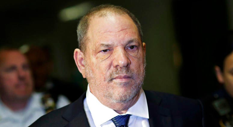 FILE - In this Oct. 11, 2018, file photo, Harvey Weinstein enters State Supreme Court in New York. A lawyer for Weinstein has asked that the disgraced movie mogul's upcoming criminal trial be moved out of New York City, saying he can't get a fair trial.