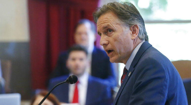 FILE - In this July 15, 2019, file photo, Oklahoma Attorney General Mike Hunter speaks during closing arguments in Oklahoma's ongoing opioid drug lawsuit against Johnson & Johnson, in Norman, Okla. Oklahoma judge rules against drugmaker, orders $572M payment