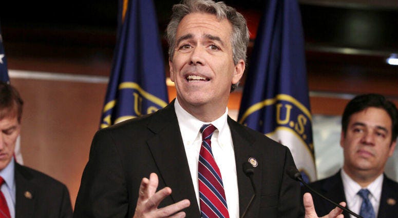 FILE - In this Nov. 15, 2011, file photo former U.S. Rep. Joe Walsh, R-Ill., gestures during a news conference on Capitol Hill in Washington. Ex-Rep. Joe Walsh making longshot GOP challenge to Trump