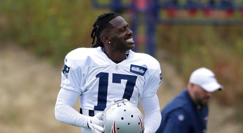 New England Patriots wide receiver Antonio Brown carries his helmet during an NFL football practice, Wednesday, Sept. 18, 2019, in Foxborough, Mass. New England Patriots wide receiver Antonio Brown carries his helmet during an NFL football practice, Wednesday, Sept. 18, 2019, in Foxborough, Mass.