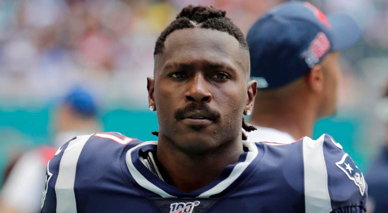 In this Sept. 15, 2019, file photo, New England Patriots wide receiver Antonio Brown (17) on the sidelines,during the first half at an NFL football game against the Miami Dolphins in Miami Gardens, Fla. The Patriots released Brown on Sept. 20, 2019. Antonio Brown