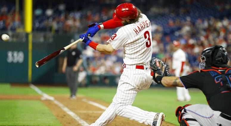 Philadelphia Phillies' Bryce Harper (3) hits a three-run home run off Miami Marlins relief pitcher Wei-Yin Chen during the sixth inning of a baseball game, Saturday, Sept. 28, 2019, in Philadelphia. Philadelphia Phillies' Bryce Harper (3) hits a three-run home run off Miami Marlins relief pitcher Wei-Yin Chen during the sixth inning of a baseball game.