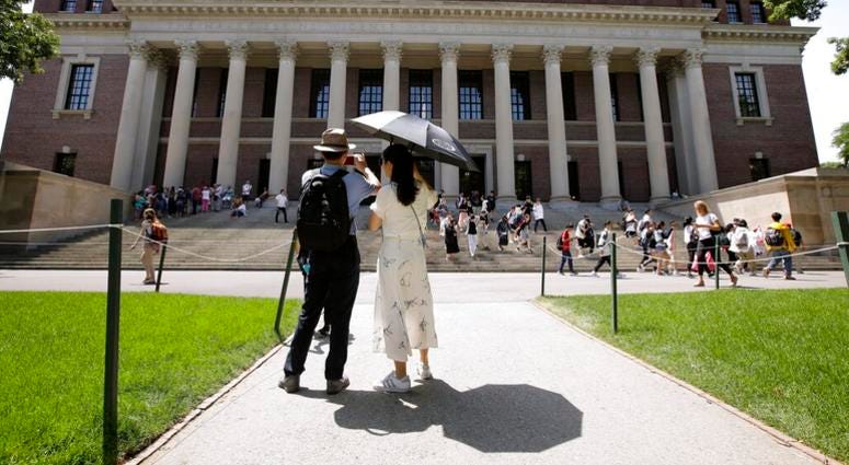 People stop to record images of Widener Library on the campus of Harvard University in Cambridge, Mass. People stop to record images of Widener Library on the campus of Harvard University in Cambridge, Mass.