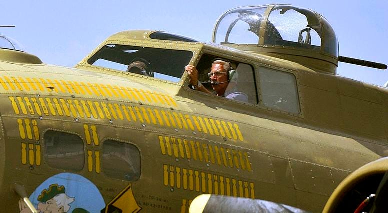 B-17 pilot Ernest "Mac" McCauley lands the B-17 flying fortress "Nine O Nine" during the Wings of Freedom Tour at the Hazleton Regional Airport in Hazleton, Pa. B-17 pilot Ernest "Mac" McCauley lands the B-17 flying fortress "Nine O Nine" during the Wings of Freedom Tour at the Hazleton Regional Airport in Hazleton, Pa.