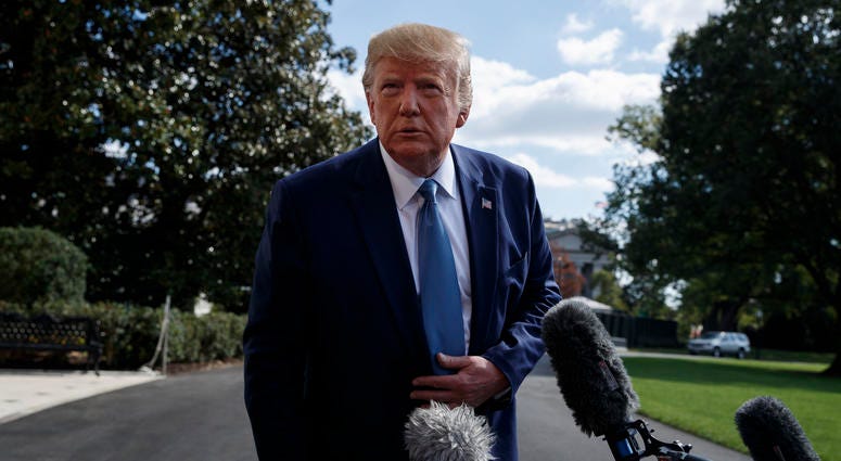 President Donald Trump talks to reporters on the South Lawn of the White House, Friday, Oct. 4, 2019, in Washington. President Donald Trump talks to reporters on the South Lawn of the White House, Friday, Oct. 4, 2019, in Washington.