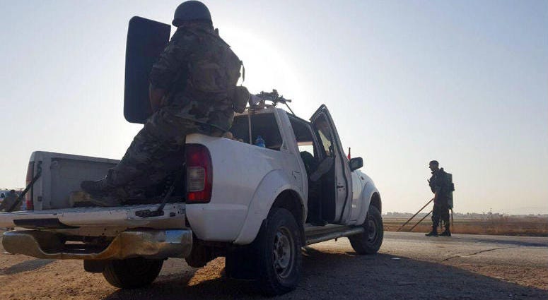 In this photo released by the Syrian official news agency SANA, Syrian troops deploy in the northern town of Tal Tamr, Monday, Oct 14, 2019. Syrian troops deploy in the northern town of Tal Tamr, Monday, Oct 14, 2019.