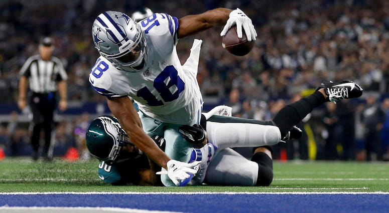 Dallas Cowboys wide receiver Randall Cobb (18) is stopped shy of the end zone after catching a pass by Philadelphia Eagles running back Boston Scott (38) in the first half of an NFL football game in Arlington, Texas, Sunday, Oct. 20, 2019. Dallas Cowboys wide receiver Randall Cobb (18) is stopped shy of the end zone after catching a pass by Philadelphia Eagles running back Boston Scott (38) in the first half of an NFL football game in Arlington, Texas, Sunday, Oct. 20, 2019.