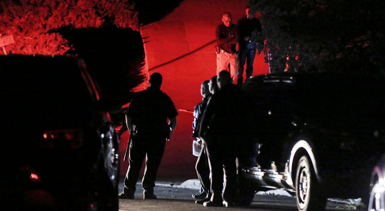 Contra Costa County Sheriff deputies investigate a multiple shooting in Orinda, Ca., on Thursday. Four people were killed and four others wounded in a Halloween night party shooting at a large rental home in a wealthy San Francisco Bay Area community. Contra Costa County Sheriff deputies investigate a multiple shooting in Orinda, Ca., on Thursday. Four people were killed and four others wounded in a Halloween night party shooting at a large rental home in a wealthy San Francisco Bay Area community.