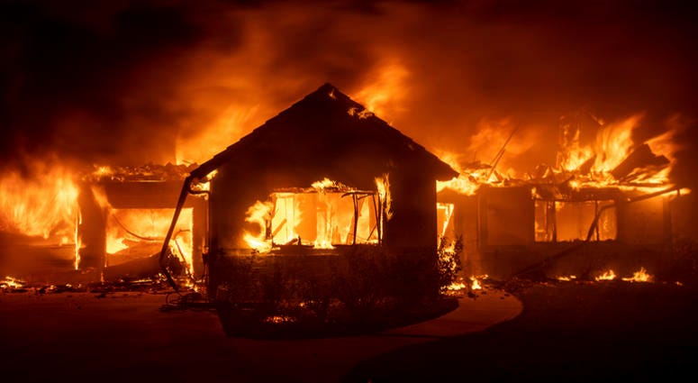 Flames from the Hillside Fire consume a home in San Bernardino, Ca. Flames from the Hillside Fire consume a home in San Bernardino, Ca.