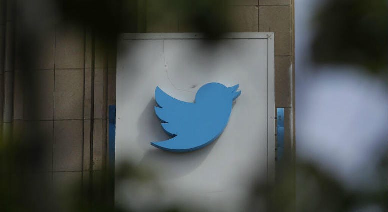 FILE - This July 9, 2019, file photo shows a sign outside of the Twitter office building in San Francisco. A sign outside of the Twitter office building in San Francisco.