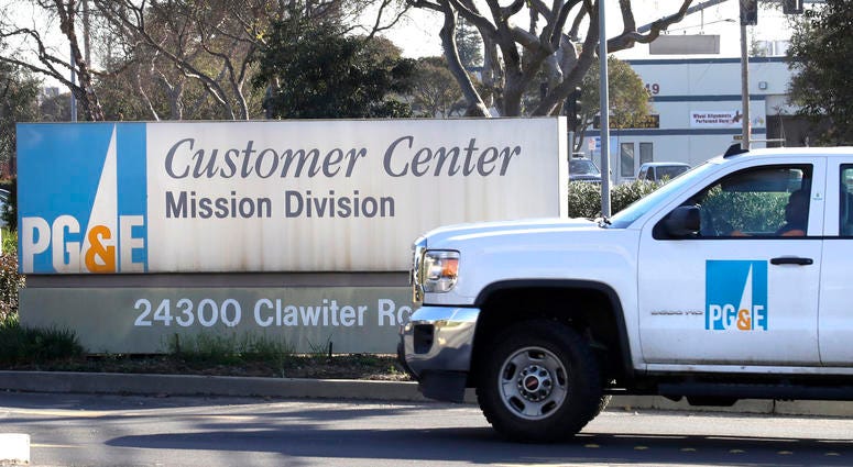 a Pacific Gas & Electric truck enters their customer center in Hayward, Calif. a Pacific Gas & Electric truck enters their customer center in Hayward, Calif.