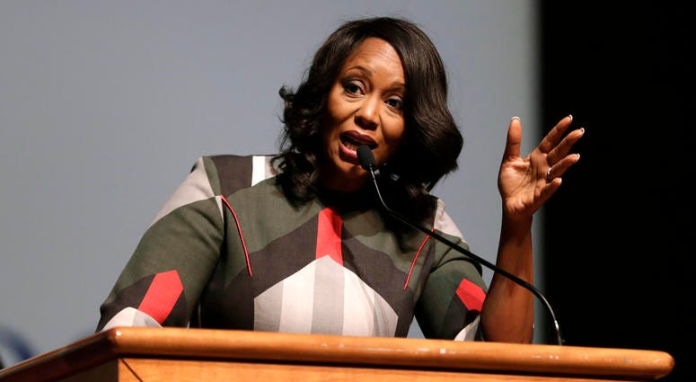 In this Oct. 23, 2019 file photo, Maya Rockeymoore Cummings speaks during a viewing service at Morgan State University, in Baltimore. Maya Rockeymoore Cummings