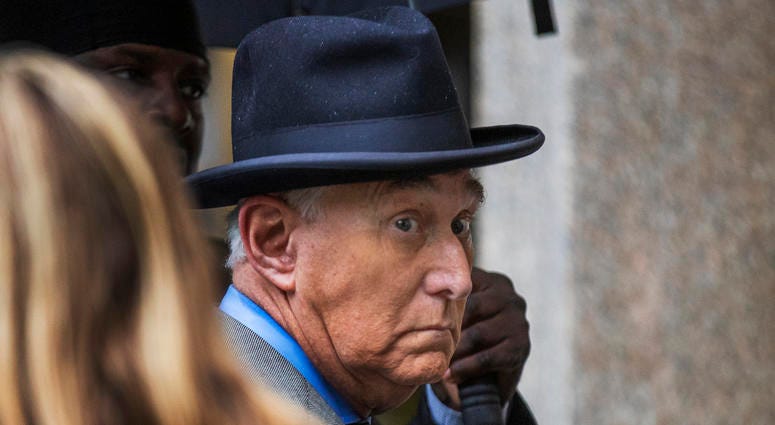 In this Nov. 12, 2019 file photo, Roger Stone, a longtime Republican provocateur and former confidant of President Donald Trump, waits in line at the federal court in Washington. Roger Stone