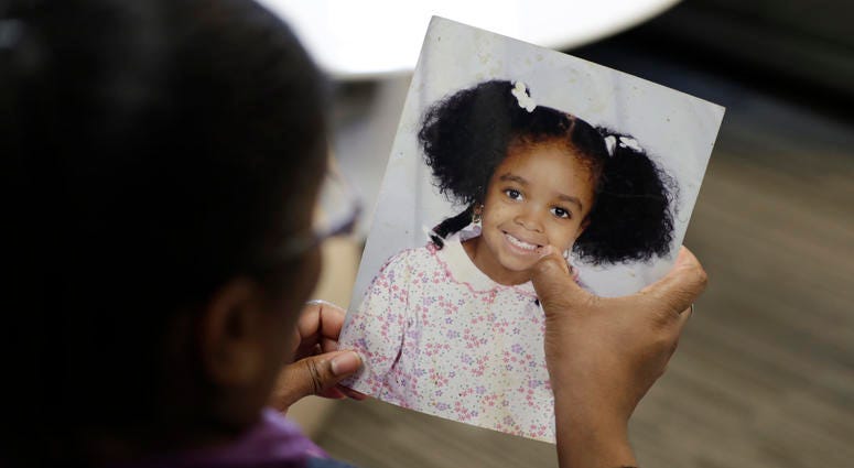 Donnesha Cooper touches a photo of her daughter, Alianna DeFreeze, in Cleveland on Oct. 29, 2019. Donnesha Cooper touches a photo of her daughter, Alianna DeFreeze, in Cleveland on Oct. 29, 2019.