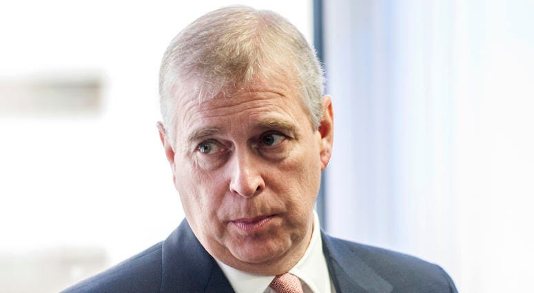 In this Monday, April 13, 2015 file photo, Britain's Prince Andrew visits the AkzoNobel Decorative Paints facility in Slough, England. Prince Andrew
