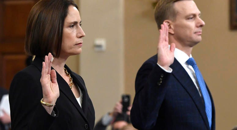 Former White House national security aide Fiona Hill, and David Holmes, a U.S. diplomat in Ukraine, are sworn in to testify before the House Intelligence Committee on Capitol Hill in Washington, Thursday, Nov. 21, 2019. Former White House national security aide Fiona Hill, and David Holmes, a U.S. diplomat in Ukraine, are sworn in to testify before the House Intelligence Committee on Capitol Hill in Washington, Thursday, Nov. 21, 2019.