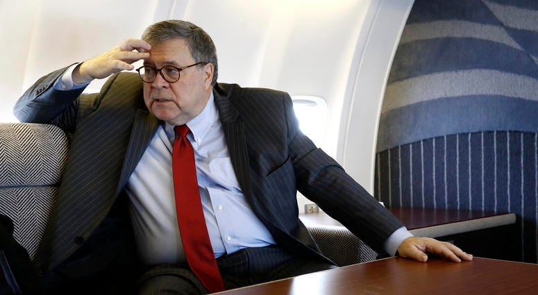 Attorney General William Barr speaks with an Associated Press reporter onboard an aircraft en route to Cleveland, Thursday, Nov. 21, 2019, during a two-day trip to Ohio and Montana. Attorney General William Barr speaks with an Associated Press reporter onboard an aircraft en route to Cleveland, Thursday, Nov. 21, 2019, during a two-day trip to Ohio and Montana.