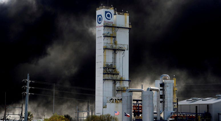 Thick smoke fills the sky above the TPC plant Wednesday, Nov. 27, 2019, in Port Neches, Texas. TPC plant explosion