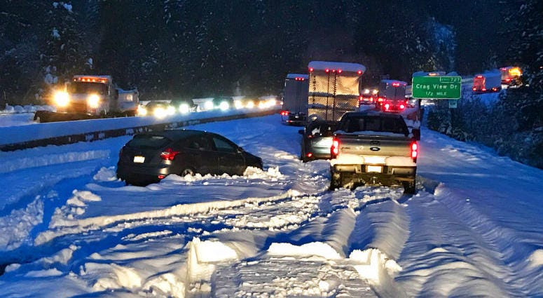 In this photo taken Tuesday, Nov. 26, 2019, provided by Caltrans, are cars and trucks in stopped traffic on Interstate 5 near Dunsmuir, Calif. Cars and trucks in stopped traffic on Interstate 5 near Dunsmuir, Calif.