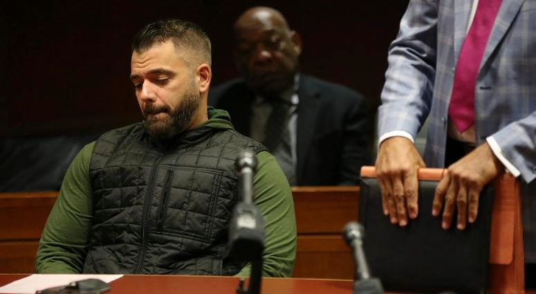 Mark D'Amico, left, sits with his lawyer, Mark Davis, after he pleads guilty to one count of misappropriating entrusted funds in Burlington County Superior Court in Mount Holly, N.J., on Friday, Dec. 6, 2019. Mark D'Amico