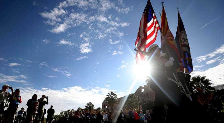 The 1941 aerial assault killed more than 2,300 U.S. troops. Nearly half — or 1,177 — were Marines and sailors serving on the USS Arizona, a battleship moored in the harbor. The University of Arizona Navy ROTC color guard present the colors during ceremonies on the school's mall commemorating the USS Arizona and Pearl Harbor Day, Tucson, Ariz., Saturday, Dec. 7, 2019.