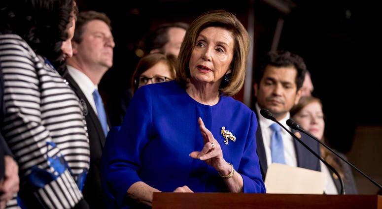 House Speaker Nancy Pelosi of Calif., accompanied by House Congress members speaks at a news conference to discuss the United States Mexico Canada Agreement (USMCA) trade agreement, Tuesday, Dec. 10, 2019, on Capitol Hill in Washington. House Speaker Nancy Pelosi of Calif., accompanied by House Congress members speaks at a news conference to discuss the United States Mexico Canada Agreement (USMCA) trade agreement, Tuesday, Dec. 10, 2019, on Capitol Hill in Washington.
