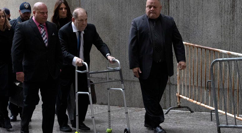 Harvey Weinstein, center, arrives for a court hearing, Wednesday, Dec. 11, 2019 in New York. Harvey Weinstein