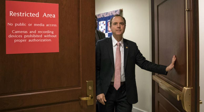 In this March 22, 2018 file photo, Rep. Adam Schiff, D-Calif., ranking member of the House Intelligence Committee, exits a secure area to speak to reporters, on Capitol Hill in Washington. In this March 22, 2018 file photo, Rep. Adam Schiff, D-Calif., ranking member of the House Intelligence Committee, exits a secure area to speak to reporters, on Capitol Hill in Washington.