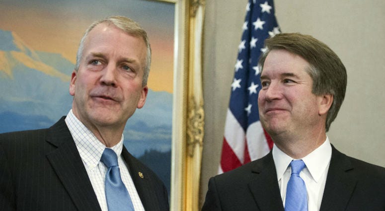 Supreme Court nominee Brett Kavanaugh, right, stands with Sen. Dan Sullivan, R-Alaska, before the start of their meeting, Thursday, July 12, 2018, on Capitol Hill in Washington. Supreme Court nominee Brett Kavanaugh, right, stands with Sen. Dan Sullivan, R-Alaska, before the start of their meeting, Thursday, July 12, 2018, on Capitol Hill in Washington.