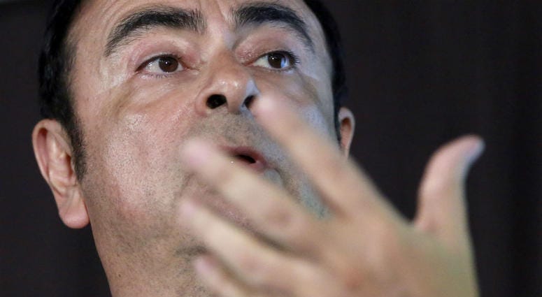 In this May 12, 2016, file photo, head of Nissan Motor Co. Carlos Ghosn answers a question during their joint press conference in Yokohama, near Tokyo. In this May 12, 2016, file photo, head of Nissan Motor Co. Carlos Ghosn answers a question during their joint press conference in Yokohama, near Tokyo.
