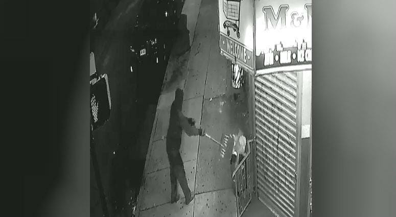 Screencap of surveillance video of a man who disposed of the dead cat after finding it outside a corner store. Screencap of surveillance video of a man who disposed of the dead cat after finding it outside a corner store.