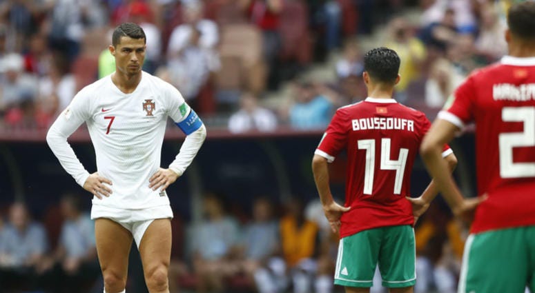 Portugal's Cristiano Ronaldo, left, prepares to shot a free kick during the group B match between Portugal and Morocco at the 2018 soccer World Cup in the Luzhniki Stadium in Moscow, Russia, Wednesday, June 20, 2018. Portugal's Cristiano Ronaldo, left, prepares to shot a free kick during the group B match between Portugal and Morocco at the 2018 soccer World Cup in the Luzhniki Stadium in Moscow, Russia, Wednesday, June 20, 2018.