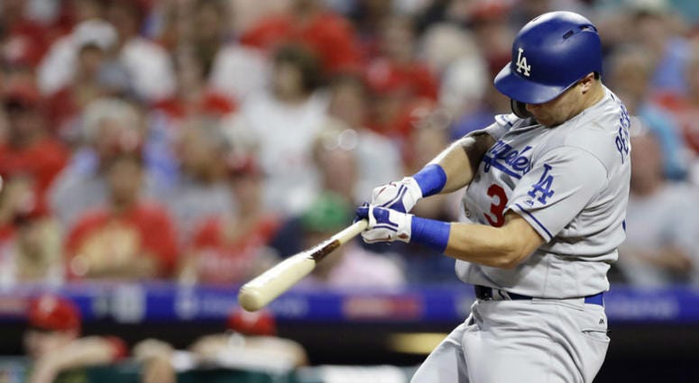 Los Angeles Dodgers' Joc Pederson hits a home run off Philadelphia Phillies relief pitcher Yacksel Rios during the fourth inning of a baseball game, Monday, July 23, 2018, in Philadelphia. Los Angeles Dodgers' Joc Pederson hits a home run off Philadelphia Phillies relief pitcher Yacksel Rios during the fourth inning of a baseball game, Monday, July 23, 2018, in Philadelphia.